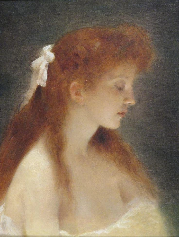 Una bellezza dai capelli rossi di profilo